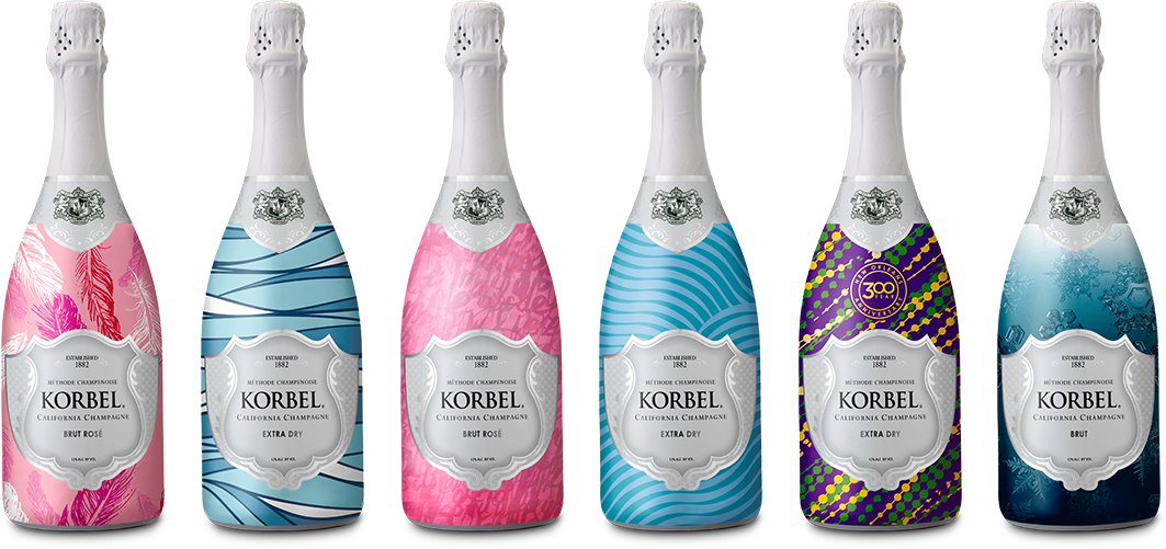 Collection of Korbel California Champagne seasonal wrap bottles designed by PriceWeber