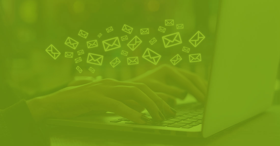 Laptop with email icons floating around it to represent elements of email marketing