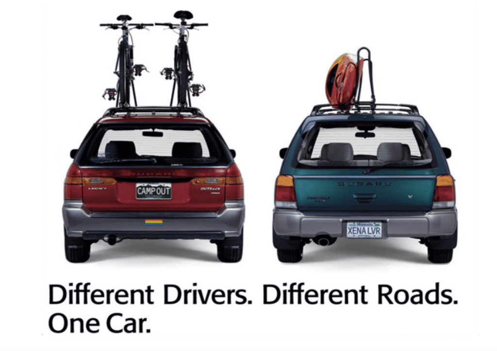 1990s ad from Subaru featuring two cars with “XENA LVR” and “CAMPOUT” license plates and a rainbow sticker