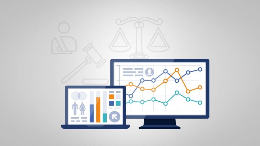 Two computer screens showing legal graphs and charts, representing SEO for personal injury