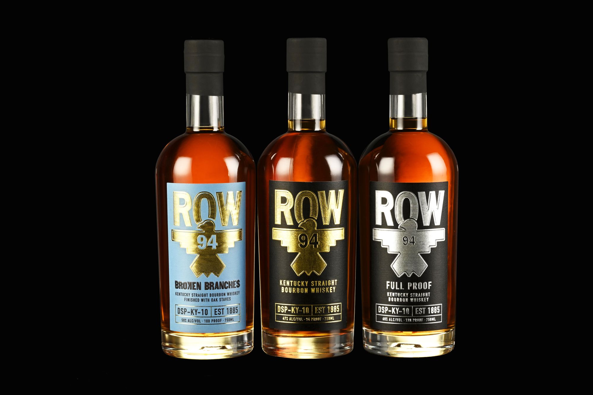 Three ROW 94 whiskey expressions photographed together