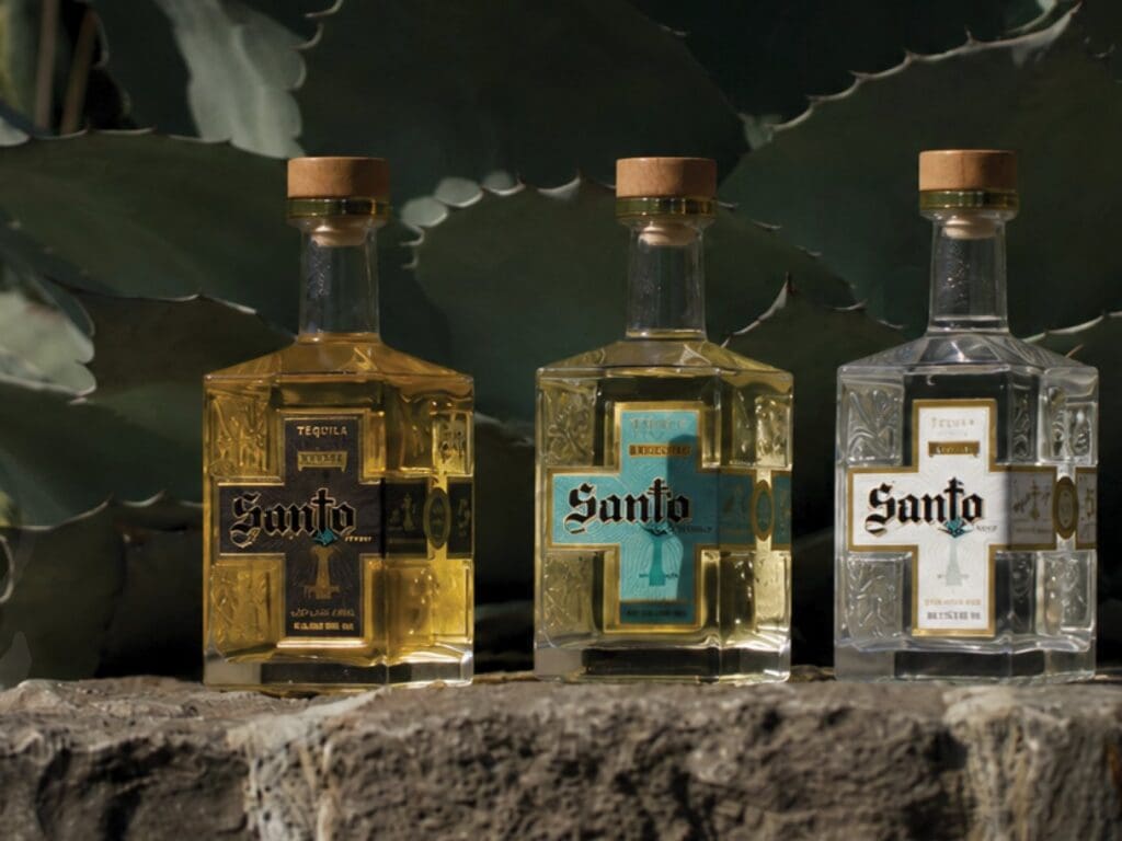 Three Santo Fino tequila bottles