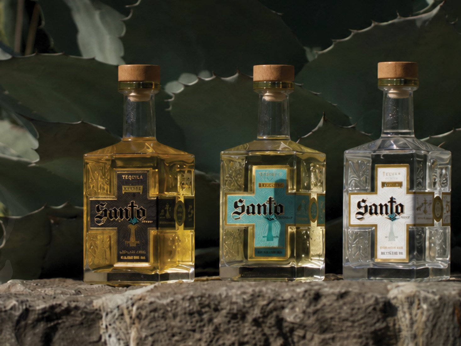 Three Santo Fino tequila bottles